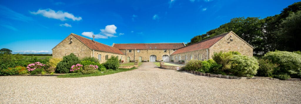 High Barn Cottages Heritage Escapes. View of all the cottages from the car-park
