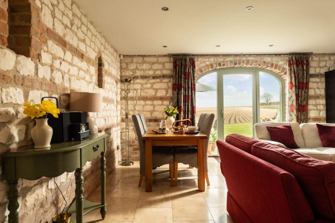 _MAR0558-Edit Hayloft living/ dining patio doors towards fields