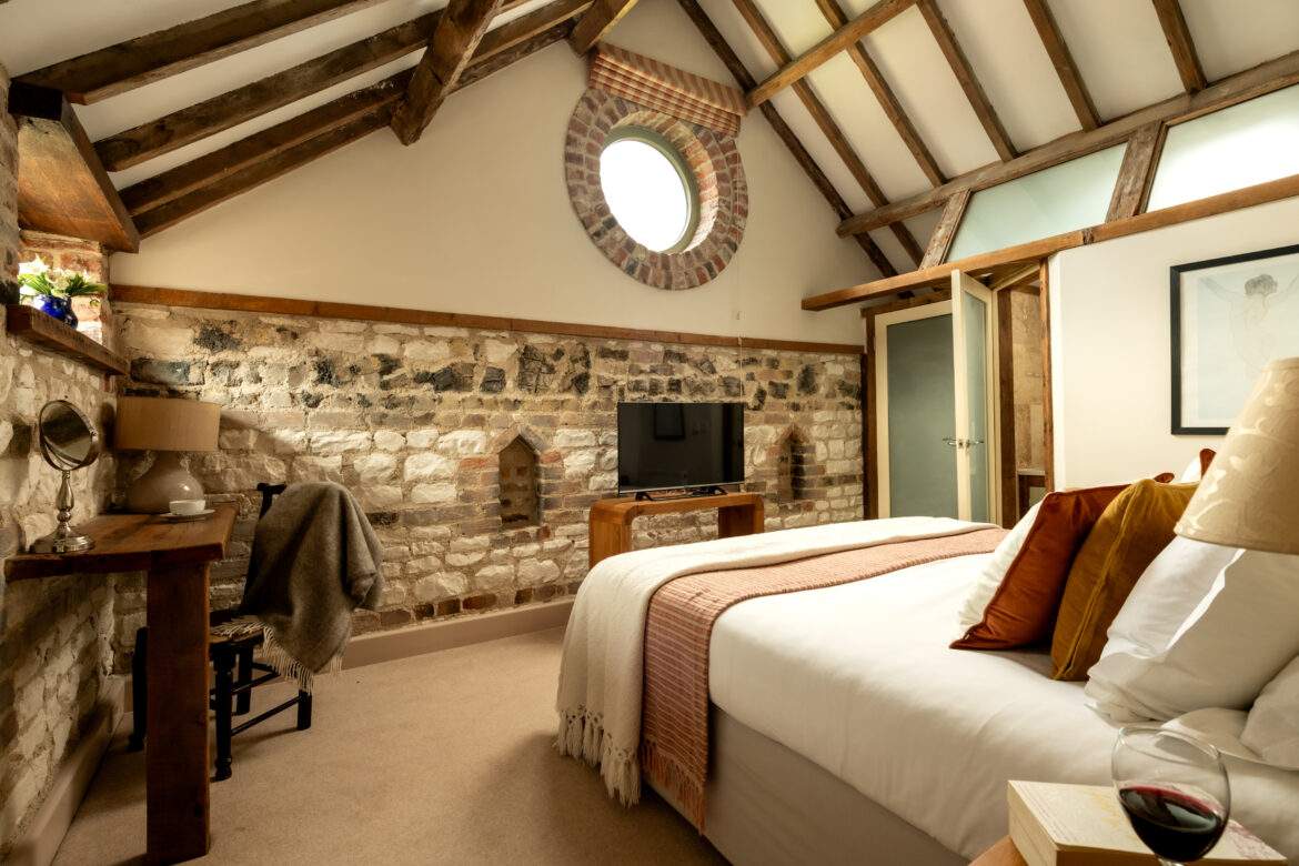 _MAR0679-Edit Hayloft master bedroom bull's eye window